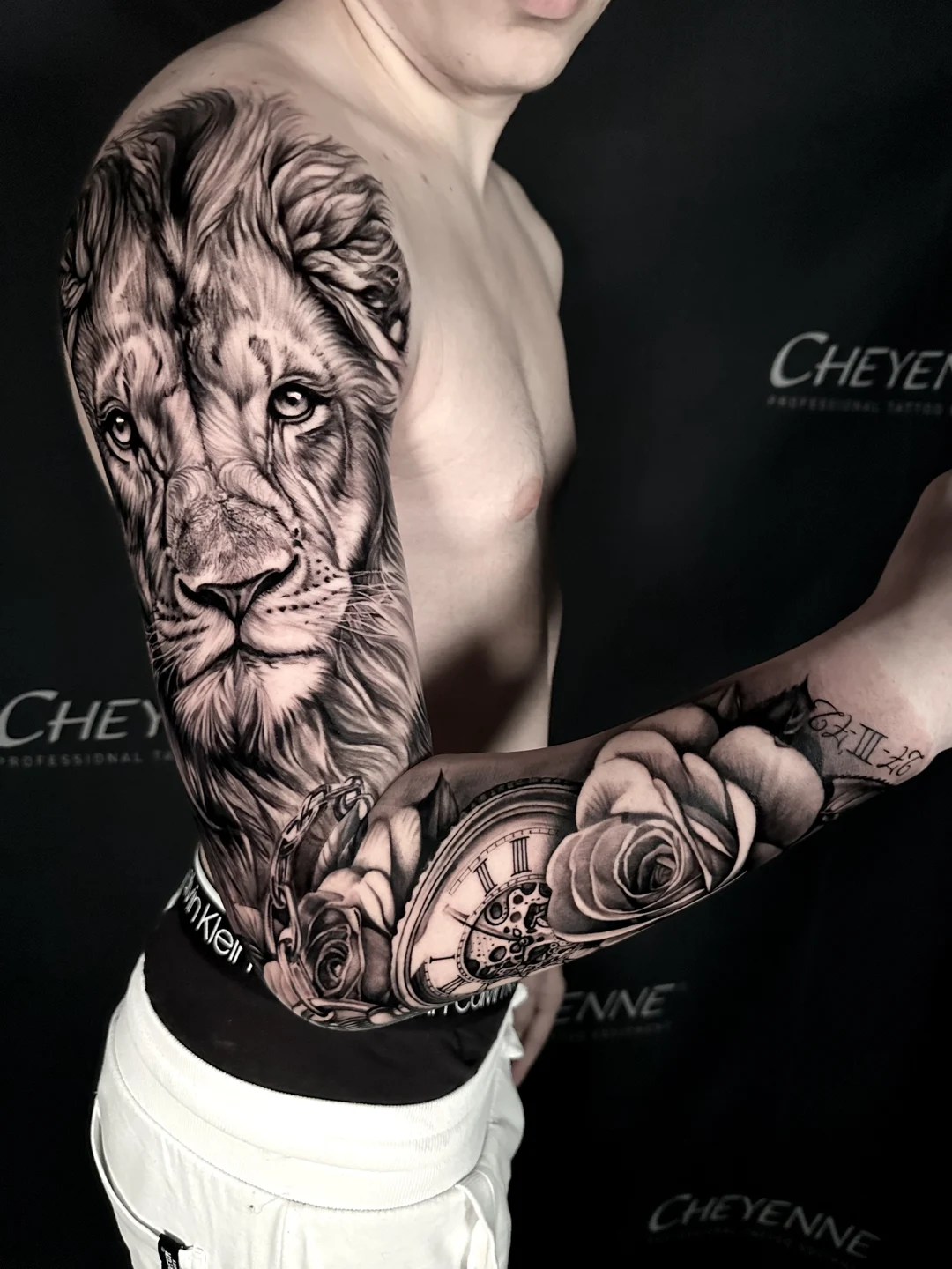 Realistic lion tattoo sleeve