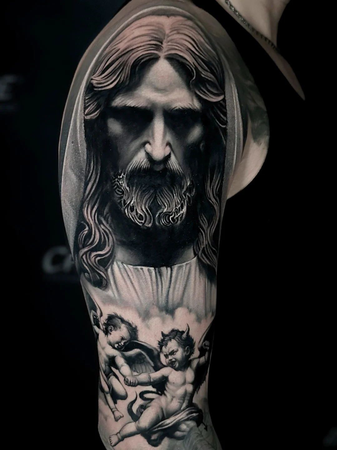 Black and grey realism religious portrait tattoo
