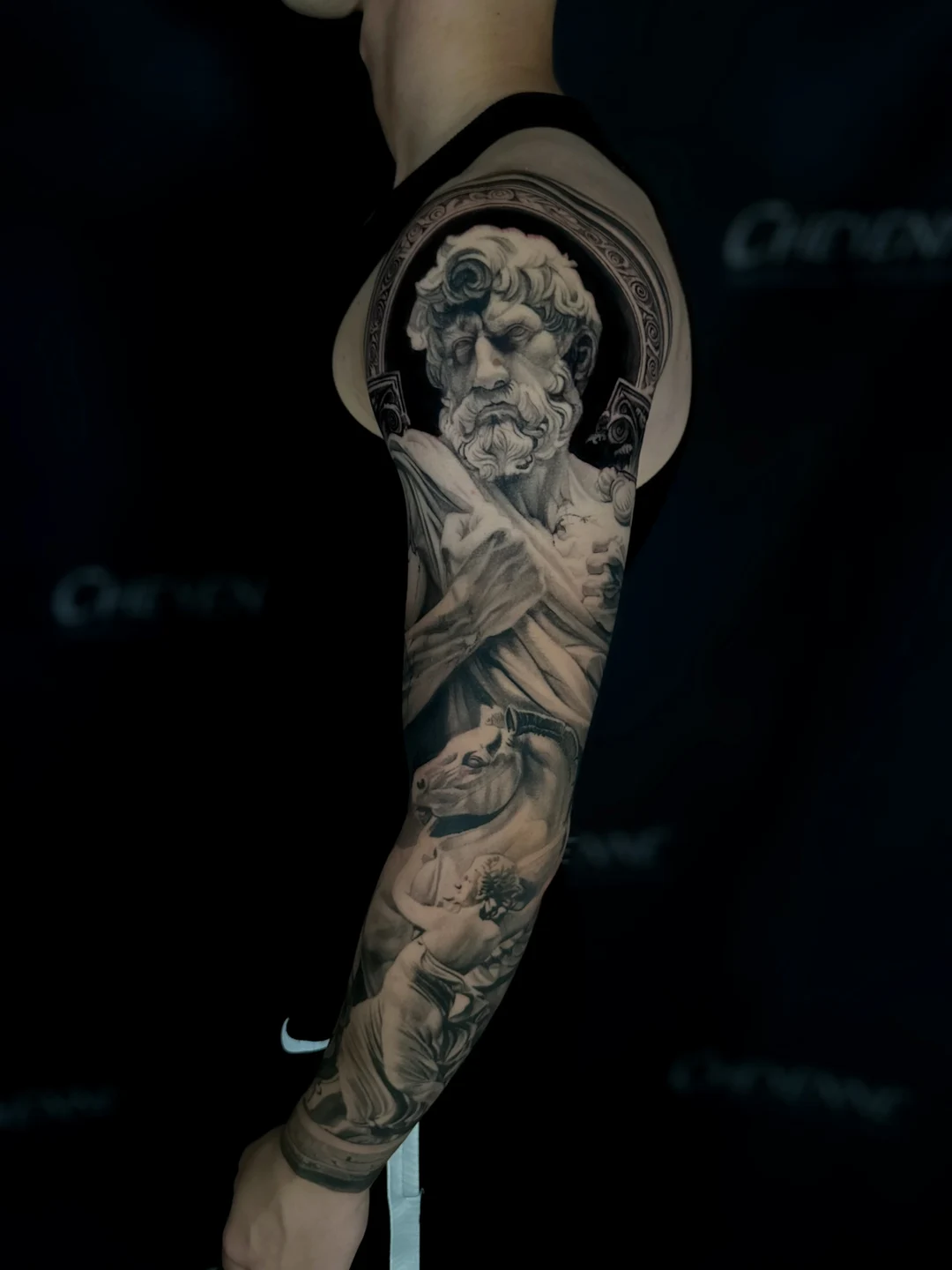 Realistic statue full sleeve tattoo, inner view