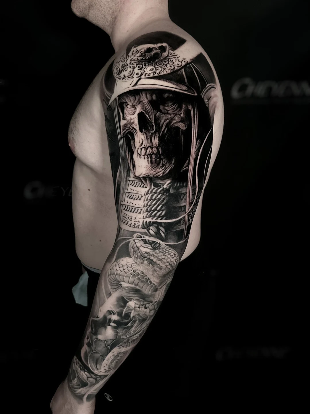 Realistic black and grey full sleeve tattoo